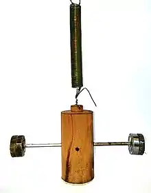 Wilberforce pendulum with wooden central mass.