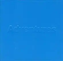 A blue cover with the word "Adventures" embossed.