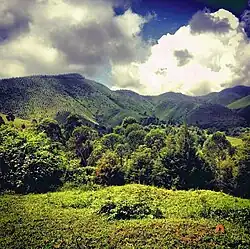 The lush, emerald-green hills enveloping the tranquil Kilungutwe, January 2014