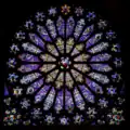 Rose window from the Basilica of St Denis, Paris, showing Jesse at the centre. This is not the earliest St Denis Jesse window, which is vertical like Chartres.