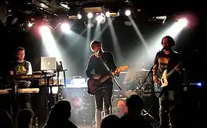 The Pineapple Thief performing live in 2013, Steve Kitch (keyboards), Bruce Soord (vocals, guitar) and Jon Sykes (bass, vocals)