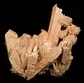 Tan thenardite pseudomorphing mirabilite crystals from the Boron, California area. Cluster is 6 x 5.5 cm.
