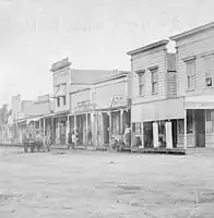 Businesses on Third Street, between Utah and Oregon (now Santa Monica Blvd.), 1880.