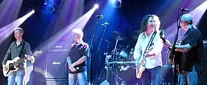 Thunder performing live in 2006. From left to right: Chris Childs, Danny Bowes, Ben Matthews and Harry James.
