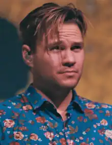 Tilian performing with Dance Gavin Dance in December 2017.