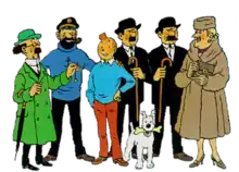 Tintin is standing in front of all of his friends