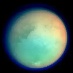 Titan showing surface and atmospheric details