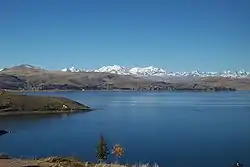 The Cordillera Real as seen from Lake Titicaca with Chachakumani and Ch'iyar Juqhu of the Guanay Municipality in the center