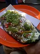 blue corn meal tlacoyo