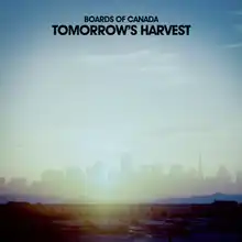A sun-lit picture of a city skyline during daytime. Black bold text above reads "Boards of Canada Tomorrow's Harvest".