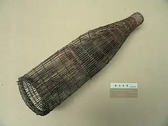 Dai bamboo fish basket. Tools and utensils in the Yunnan Nationalities Museum, Kunming, Yunnan, China.