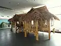 Dai bamboo house. Tools and utensils in the Yunnan Nationalities Museum, Kunming, Yunnan, China.