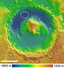 Gale Crater with Aeolis Mons rising from the center. The noted Curiosity rover landing area is near Peace Vallis in Aeolis Palus.