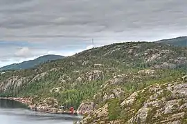 Torfjellet; pine clad hills and narrow bays and fjords are typical here