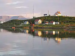 View of the Kåja island with Torsvåg Lighthouse off Vanna