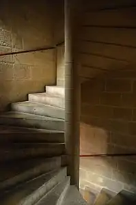 the narrow winding stairway to the upper chambers of the tower