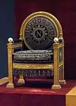 Throne of Napoleon I; by Georges Jacob and François-Honoré-Georges Jacob-Desmalter; 1804; embroidered velvet, gilt wood and ivory; height: 1.2 m; Louvre