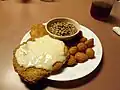 Chicken fried steak, corn nuggets, purple hull peas