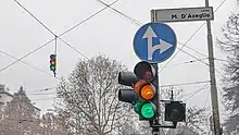 These traffic lights in Turin, Italy, are not up to the Italian traffic code. Since 1993, the green and amber lights should light up separately.