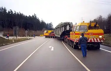 Onward transportation of the large transformer by road to the electricity substation