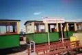 Steam tram at tramstop Valkenburgse Meer, with narrow gauge museum at the background