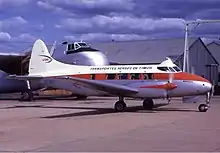 TAT's de Havilland Dove CR-TAG "Manatuto" at Bankstown Airport, Sydney, early 1970s