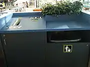 Trash and recycling bins inside YVR