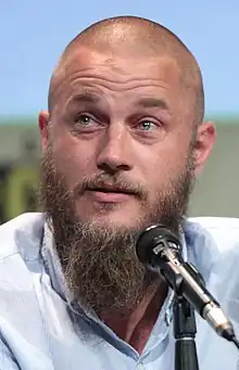 Fimmel at a microphone