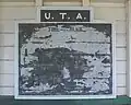 Remains of timetable poster inside former "up" platform shelter