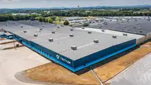 A photo from above of a large warehouse structure.
