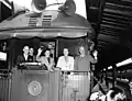 President Harry Truman (Democrat) and his family embark on a whistle-stop tour during his 1948 reelection campaign