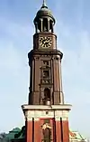 „The tower of Sankt Michaelis (Hamburg) allows to see three seas: The sea of houses during day, the sea of lights during the night and the see nothing on foggy days.