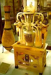 Alabaster Jar depicting the sema tawy symbol with Hapy. From the tomb of Tutankhamun.