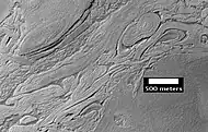 Twisted terrain in Hellas Planitia (actually located in Noachis quadrangle).