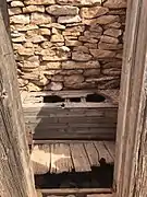 Inside the outhouse