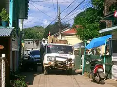 Typical traffic jam, there are only a handful of old pick-up trucks on the entire island