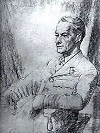 Half-portrait of seated man in military uniform