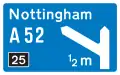 Motorway junction ahead, displaying the route number and destination reached by taking this route