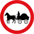 Horse-drawn vehicles prohibited. This sign may additionally display an exception plate (for example: 'Except for access')