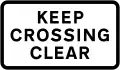 Supplementary plate warning drivers to not block the level crossing
