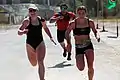 Ruth Anderson-Horrell (l) and Christy Phillips Adkins (r) sprint to the finish line of the 2012 Reebok CrossFit Games event  2.