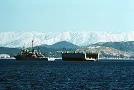 USS Brunswick towing Adept on 24 February 1992