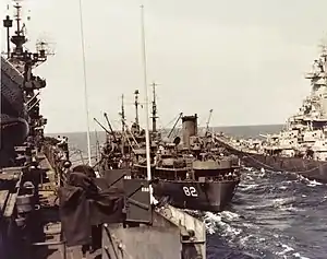 USS Cahaba (AO-82) fueling USS Iowa (BB-61) and USS Shangri-La (CV-38) in 1945