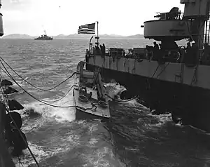 An LCVP bucks in the well of USS Catamount (LSD-17) during mine clearance operations off Chinnampo, North Korea, in November 1950