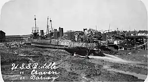 USS Craven (TB-10), Biddle (TB-26) and Barney (TB-25) washed ashore at Charleston Navy Yard by a hurricane on 28 August 1911.