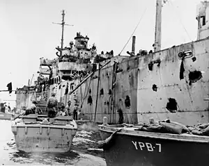 USS Mindanao (ARG-3) damaged by the explosion of USS Mount Hood (AE-11) in Seeadler Harbor on November 10, 1944