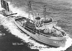 USS Unadilla (ATA-182) underway while towing a target sled, date and location unknown