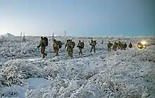 Soldiers test a new modular body armor system in the extreme cold at CRTC.