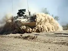 A M1126 infantry carrier vehicle conducting desert mobility testing at YTC