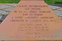 In Appreciation (by the people of) Alsace to the 1st French Army of the Rhine and Danube and their American Comrades (who) liberated Alsace 1944-1945. The U.S. 21st Army Corps, U.S. 12th Armored Division, the U.S. 3rd, 28th, 75th, 36th, 45th, 63rd, 103rd Infantry Divisions.